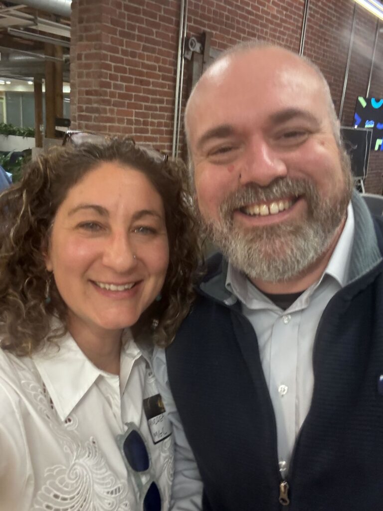 Two guests taking a selfie at the party