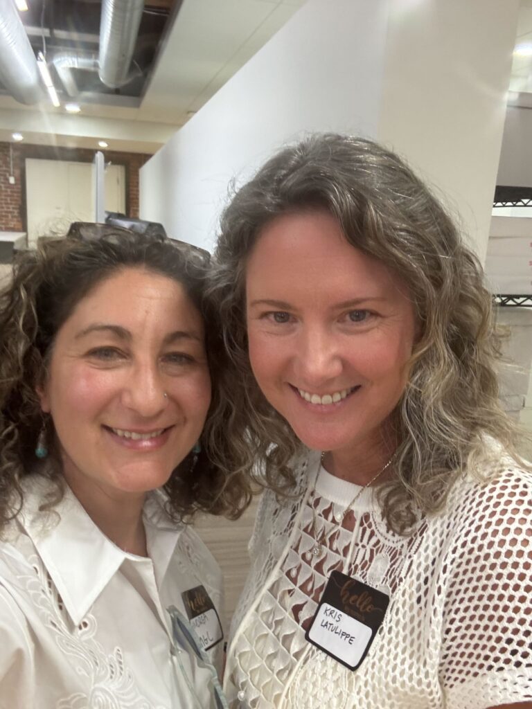 Two guests smiling for a selfie